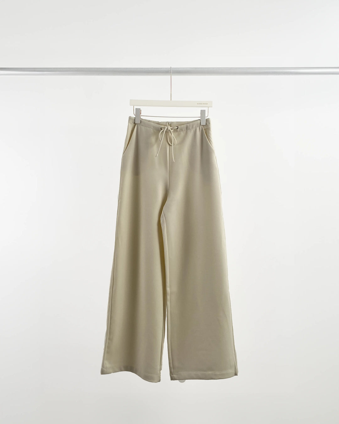 An image of a  Creme-Large 1254Q Comfy Throw On Pants by  Mirra Masa