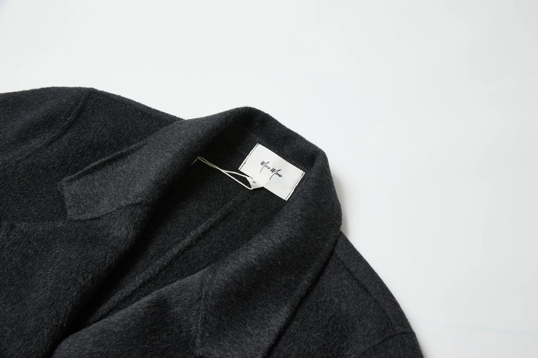 An image of a   1334D Long Wool Coat by  Mirra Masa