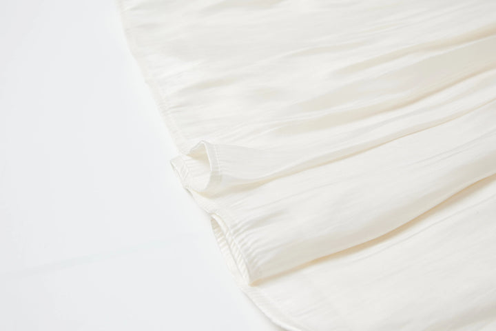 An image of a   16839 Silky Pleated Skirt by  Mirra Masa