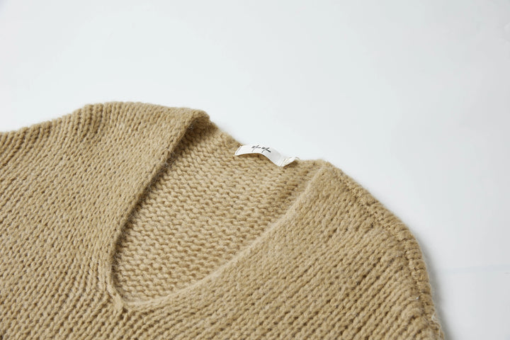 An image of a   1864Q Rib Knit Sweater by  Mirra Masa