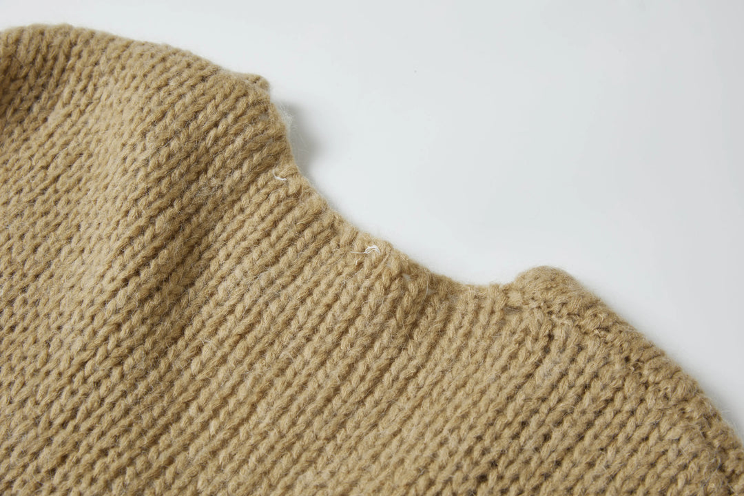 An image of a   1864Q Rib Knit Sweater by  Mirra Masa