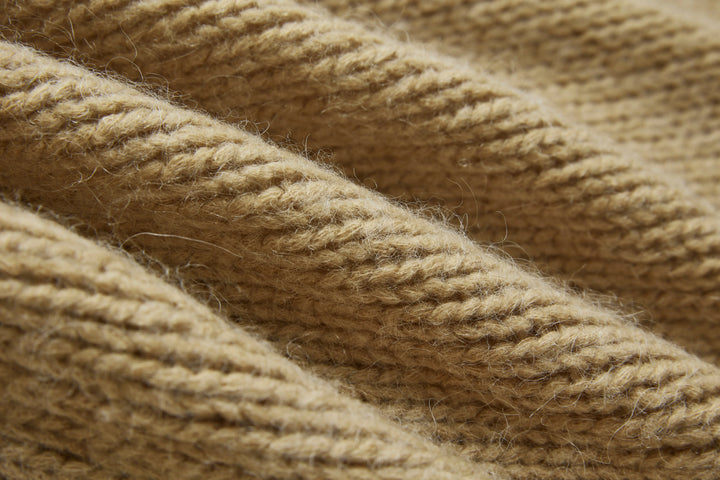 An image of a   1864Q Rib Knit Sweater by  Mirra Masa