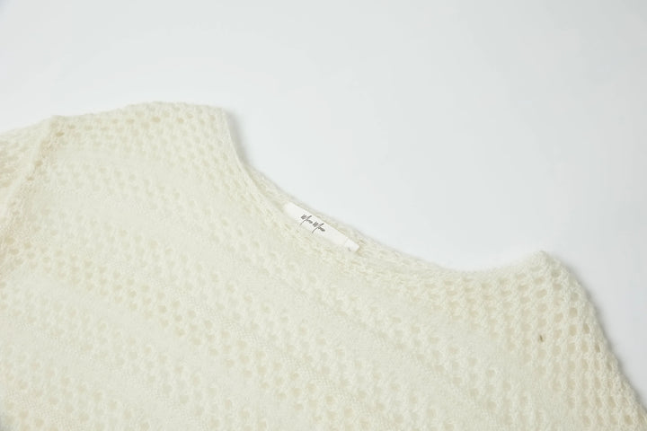 An image of a   1935C Knit Top by  Mirra Masa