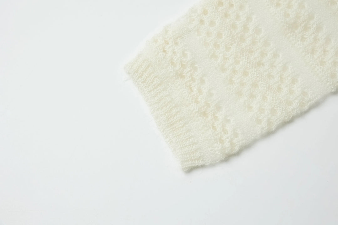 An image of a   1935C Knit Top by  Mirra Masa