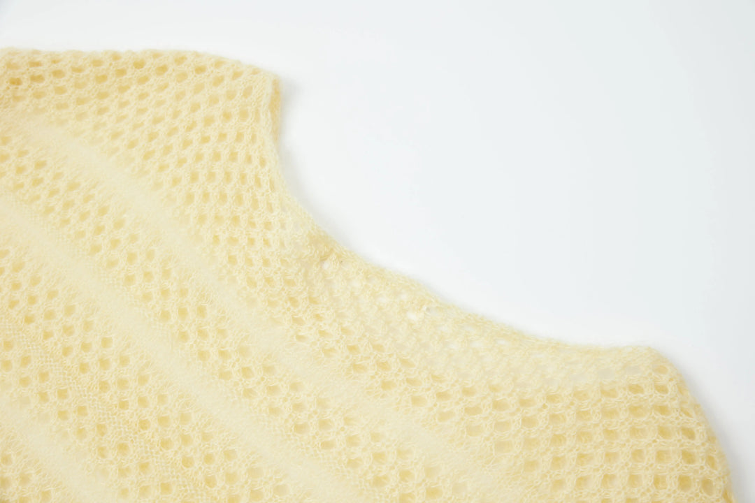 An image of a   1935C Knit Top by  Mirra Masa