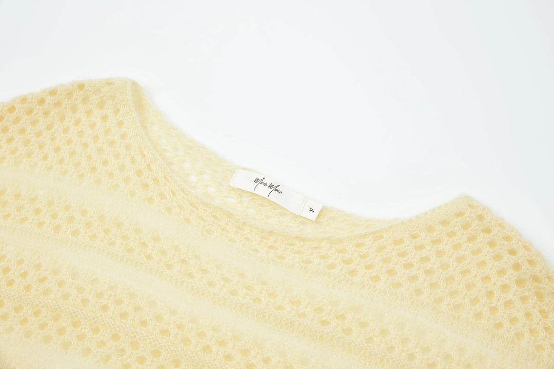 An image of a   1935C Knit Top by  Mirra Masa