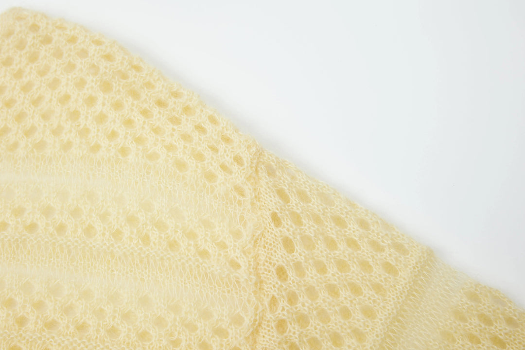 An image of a   1935C Knit Top by  Mirra Masa