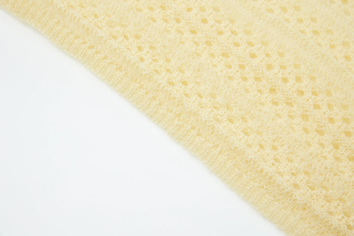 An image of a   1935C Knit Top by  Mirra Masa