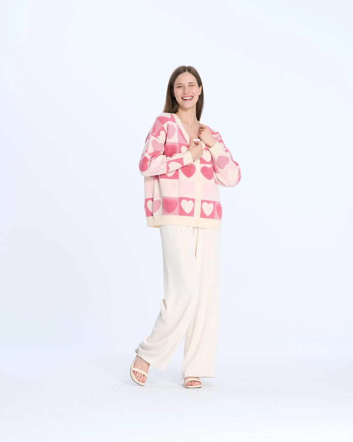 An image of a   1M01 Hearty Cardigan by  Mirra Masa