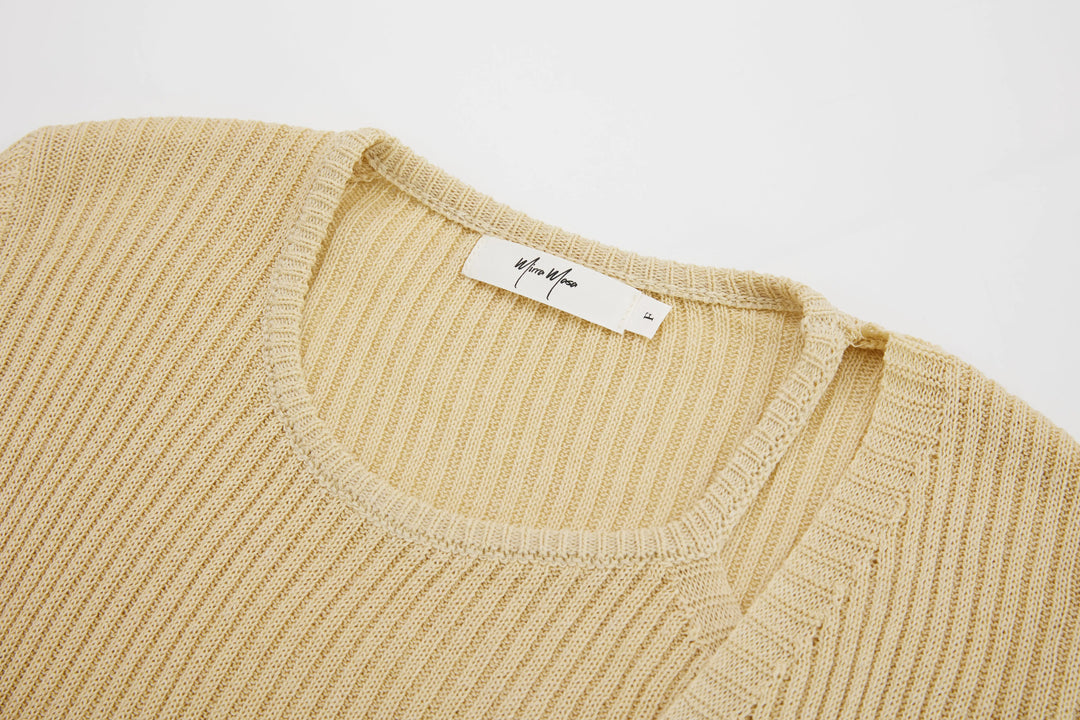 An image of a   20242 Layered Knit Top by  Mirra Masa