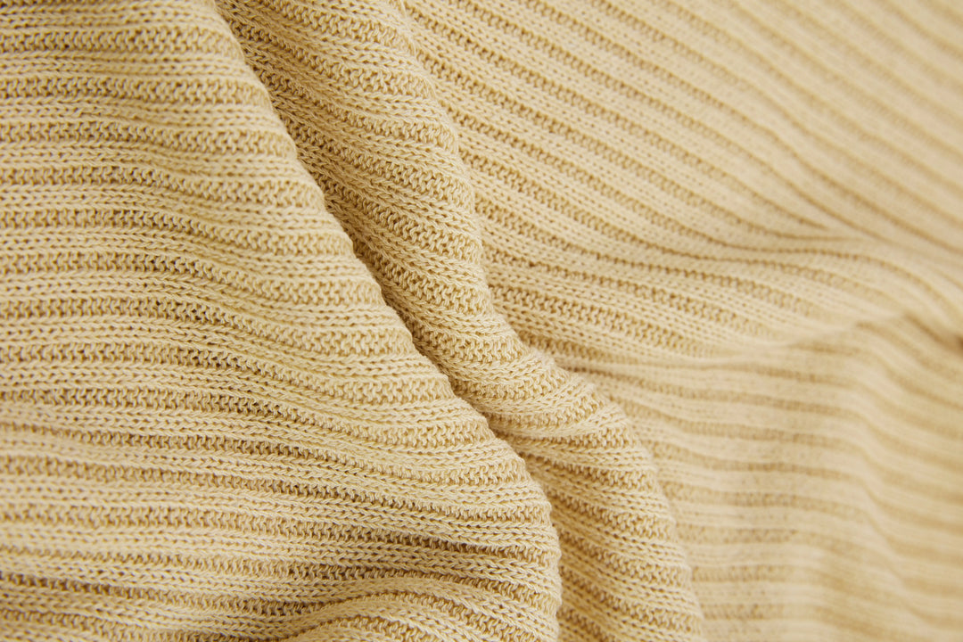 An image of a   20242 Layered Knit Top by  Mirra Masa