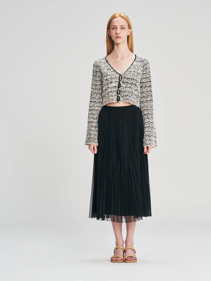 An image of a   205519 Reversible Pleated Skirt by  Mirra Masa