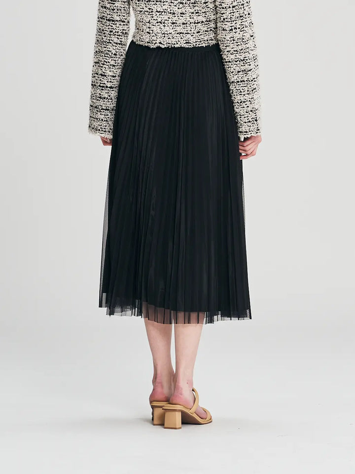 An image of a   205519 Reversible Pleated Skirt by  Mirra Masa