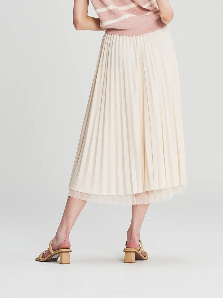 An image of a   205519 Reversible Pleated Skirt by  Mirra Masa