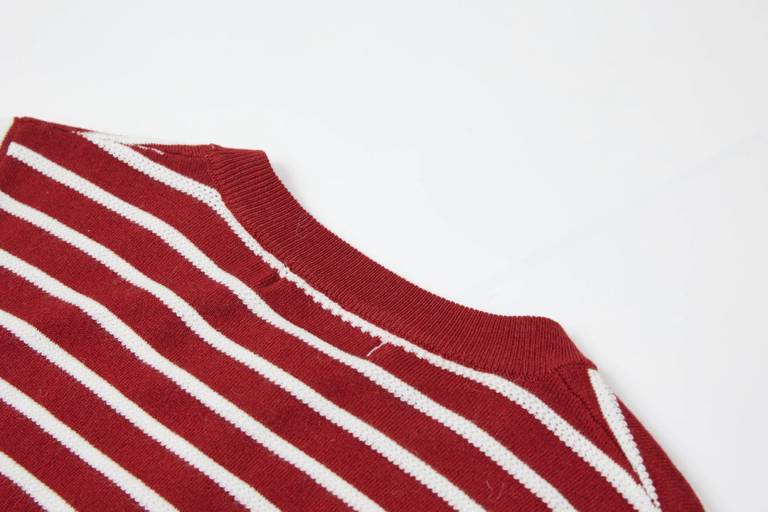 An image of a   2144Q Striped Button Down Sweater by  Mirra Masa