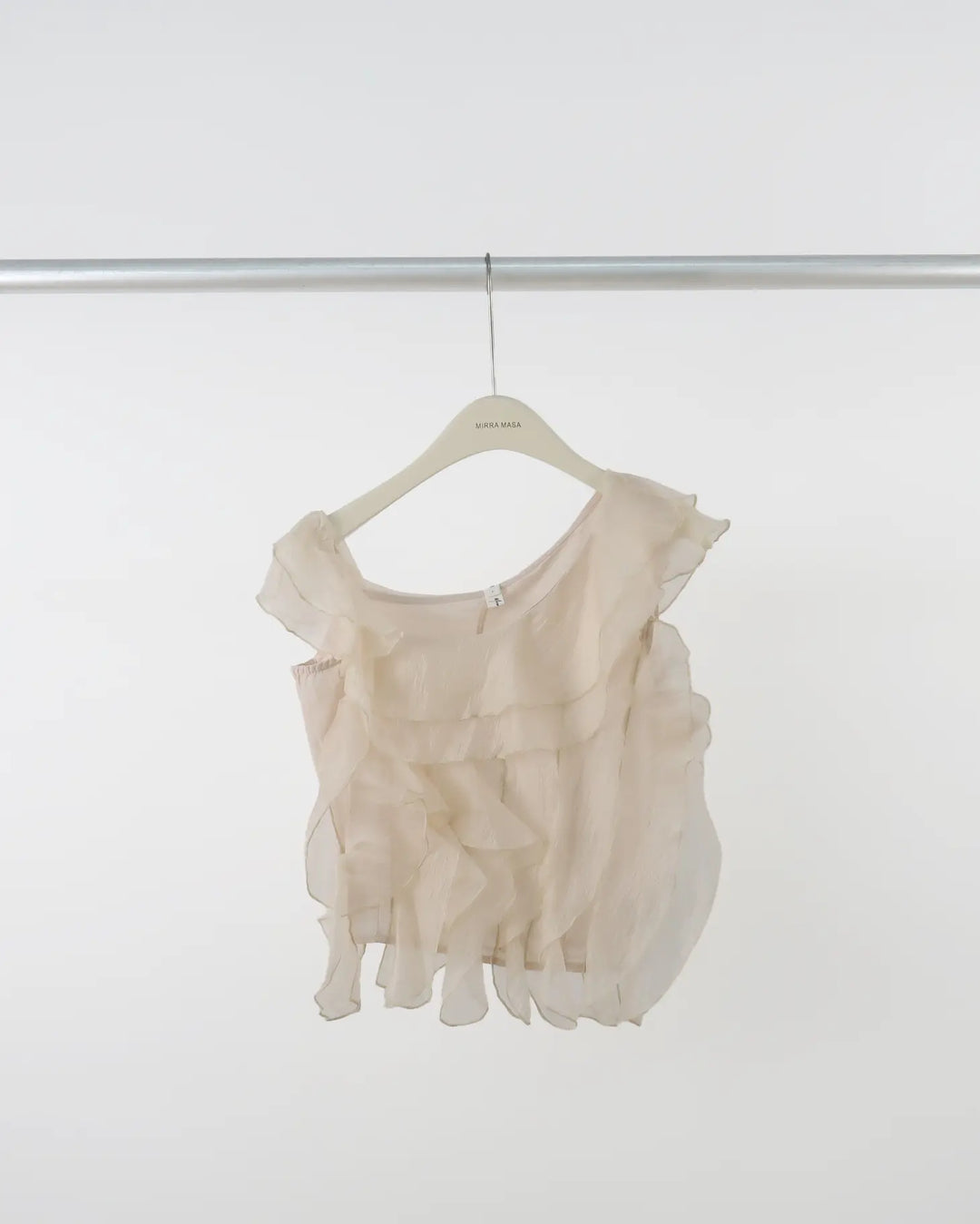 An image of a  Almond-One-Size 23368 Ruffled Top by  Mirra Masa