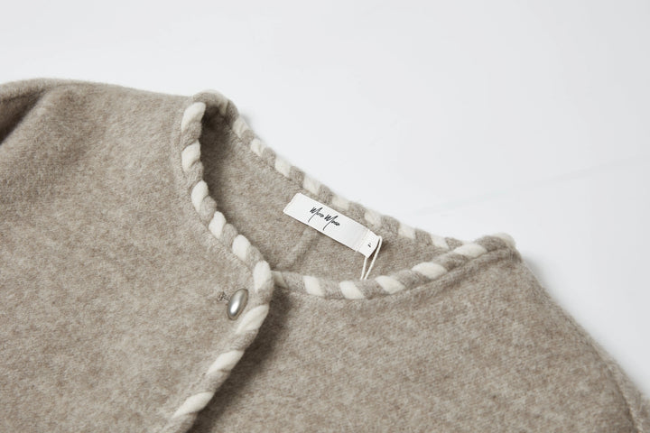 An image of a   2684Q Trimmed Wool Jacket by  Mirra Masa