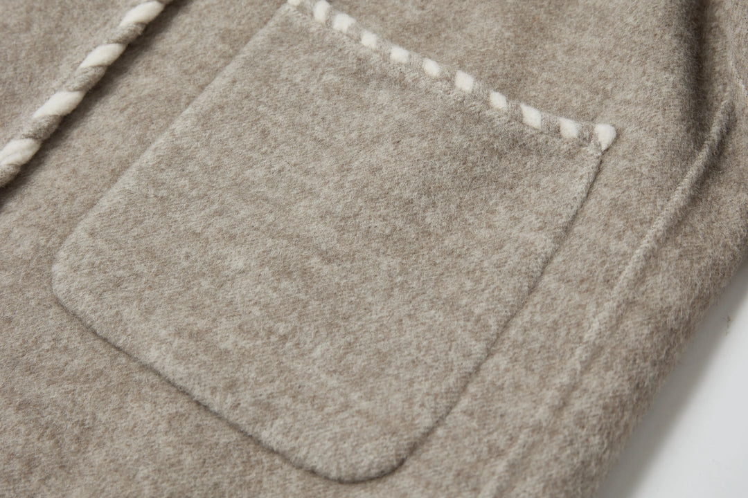 An image of a   2684Q Trimmed Wool Jacket by  Mirra Masa