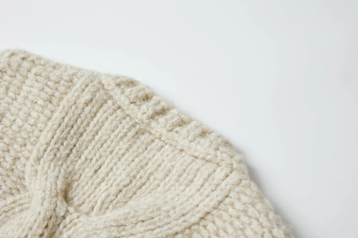 An image of a   3374Q Cable Knit Cardigan by  Mirra Masa