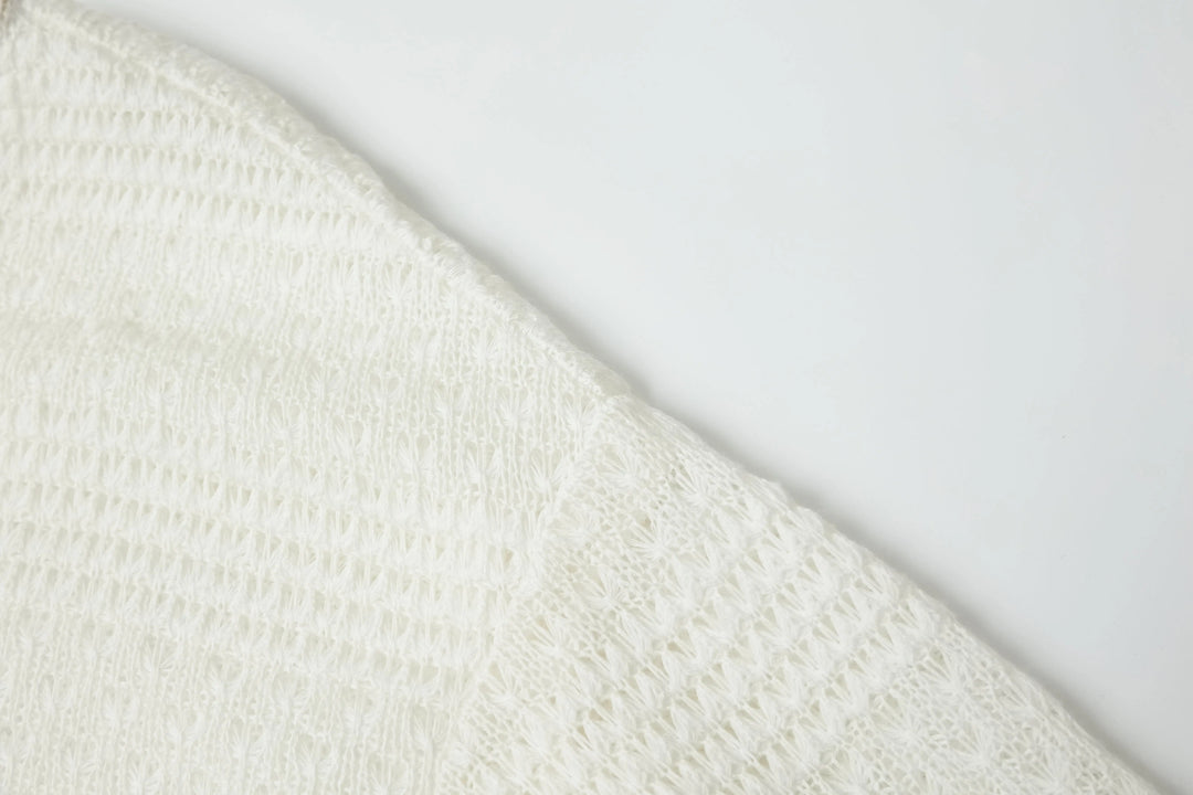 An image of a   4635C Knit Top by  Mirra Masa