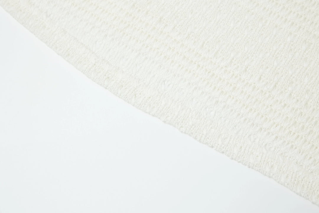 An image of a   4635C Knit Top by  Mirra Masa