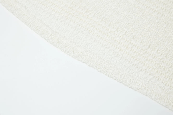 An image of a   4635C Knit Top by  Mirra Masa