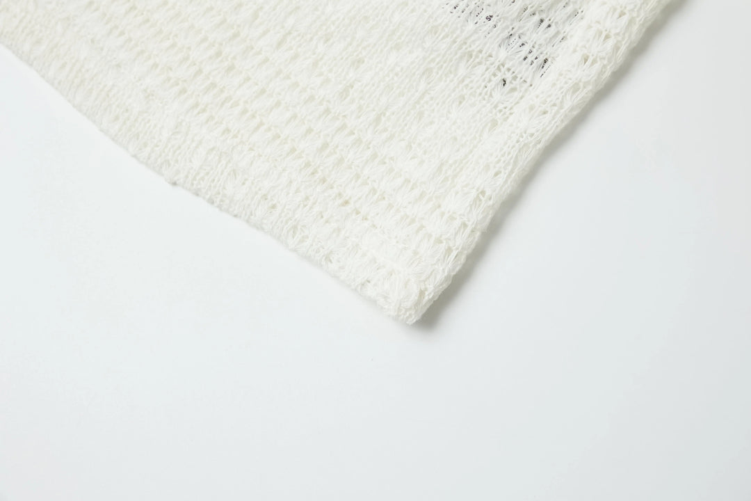 An image of a   4635C Knit Top by  Mirra Masa