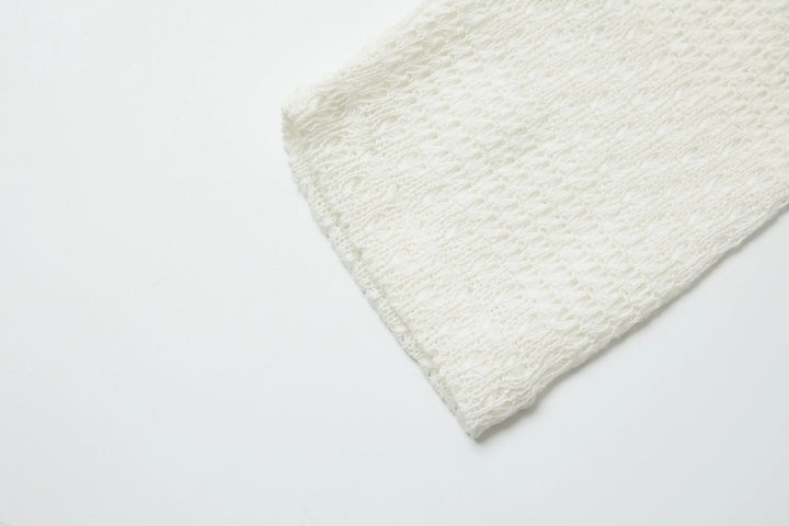 An image of a   4635C Knit Top by  Mirra Masa