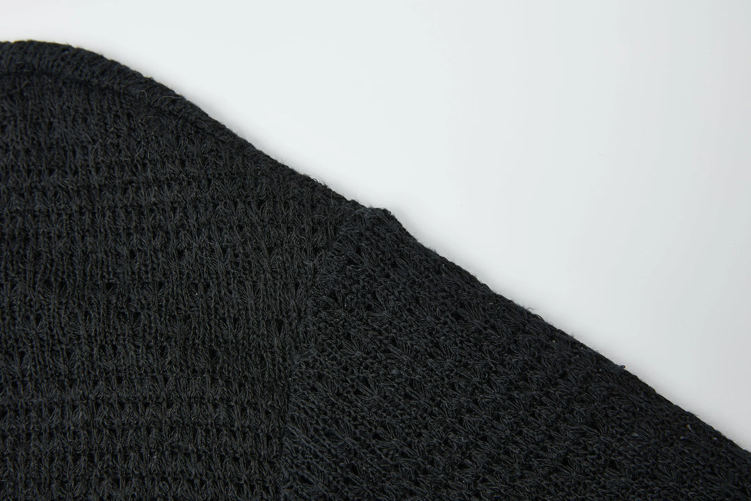 An image of a   4635C Knit Top by  Mirra Masa