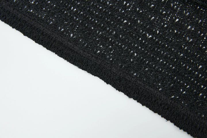 An image of a   4635C Knit Top by  Mirra Masa