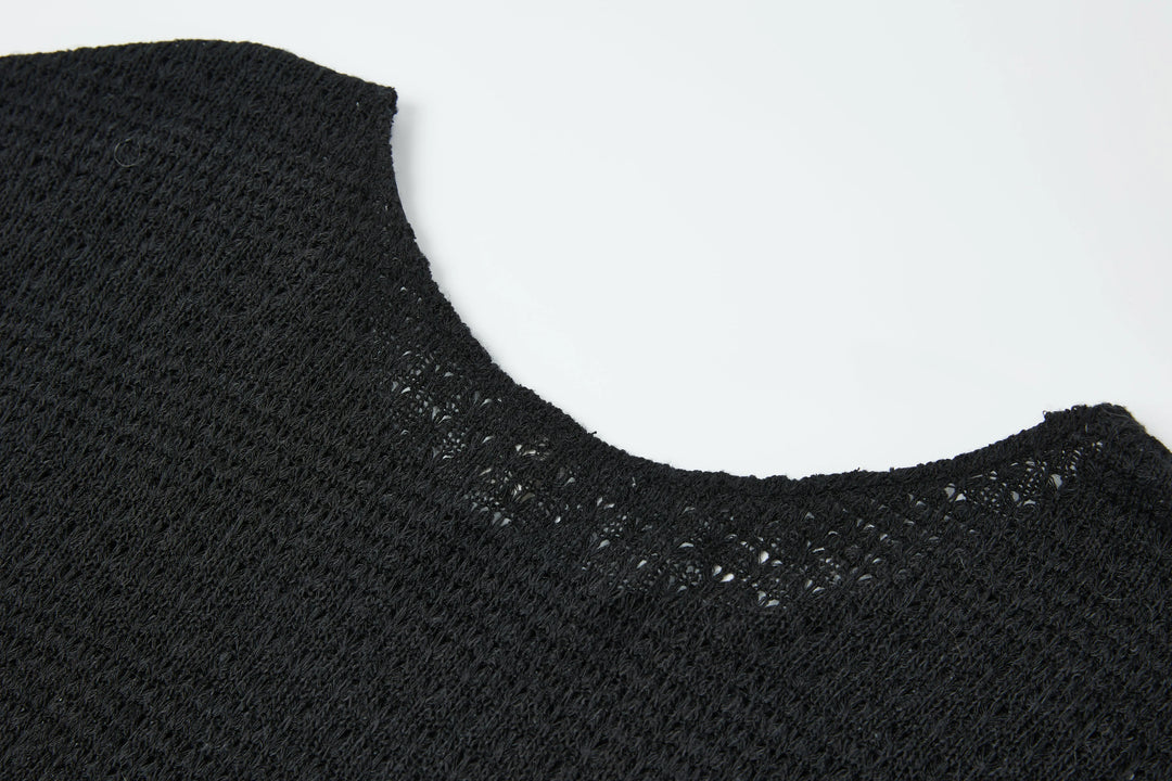 An image of a   4635C Knit Top by  Mirra Masa