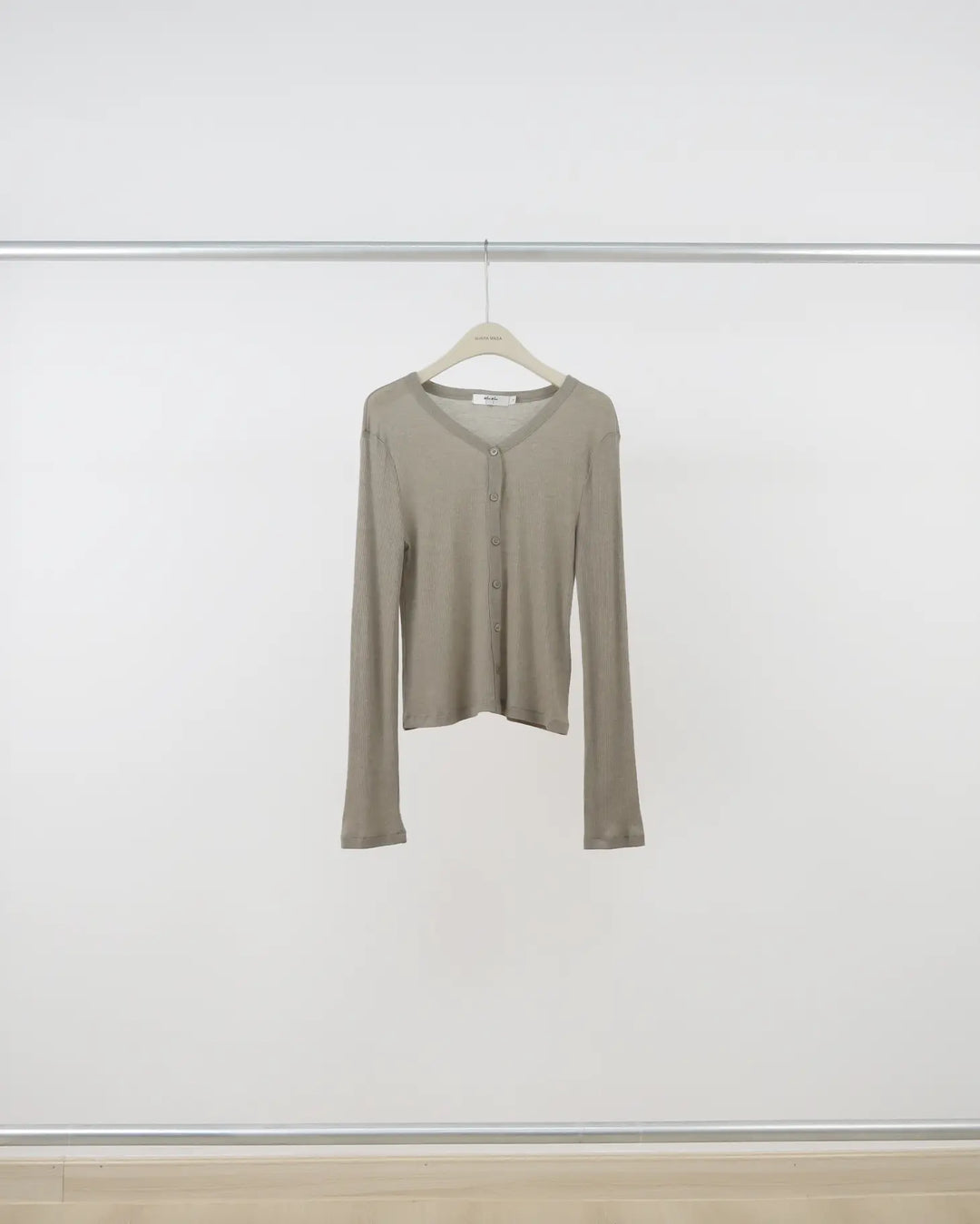 An image of a  Green-One-Size 60005 Knit Top by  Mirra Masa