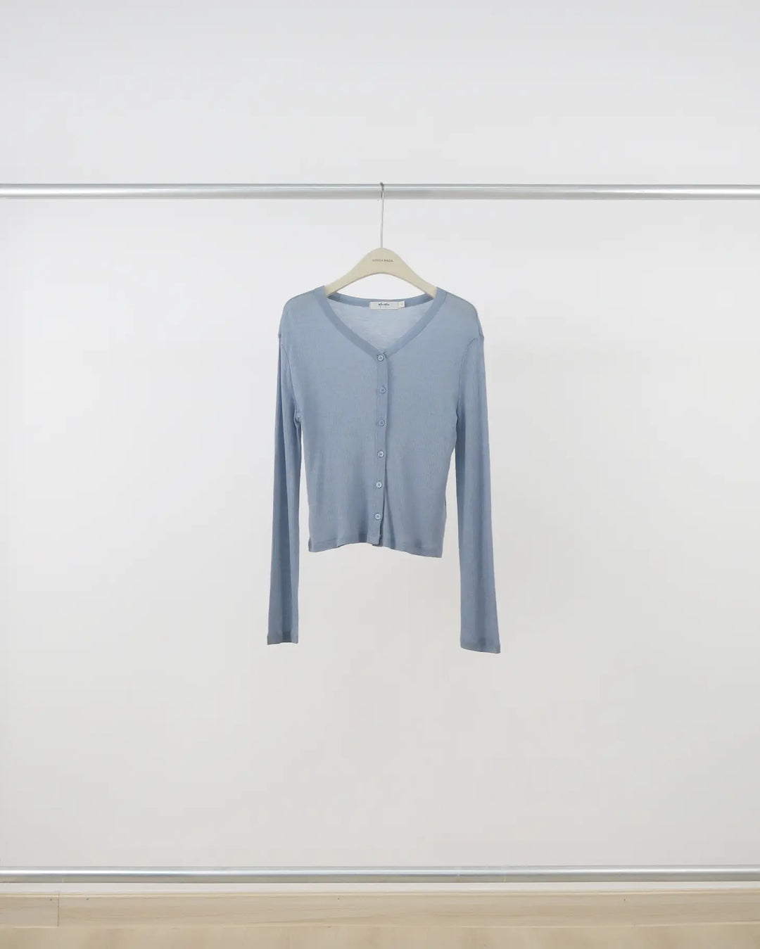 An image of a  Blue-One-Size 60005 Knit Top by  Mirra Masa