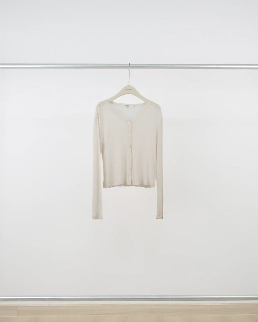 An image of a  Almond-One-Size 60005 Knit Top by  Mirra Masa