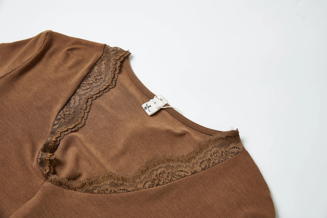 An image of a   6154Q Laced and Layered Knit Top by  Mirra Masa