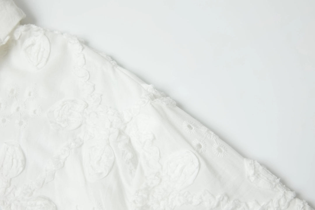 An image of a   8225C Embroidery Blouse by  Mirra Masa