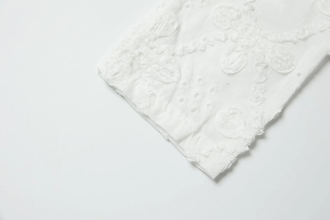 An image of a   8225C Embroidery Blouse by  Mirra Masa