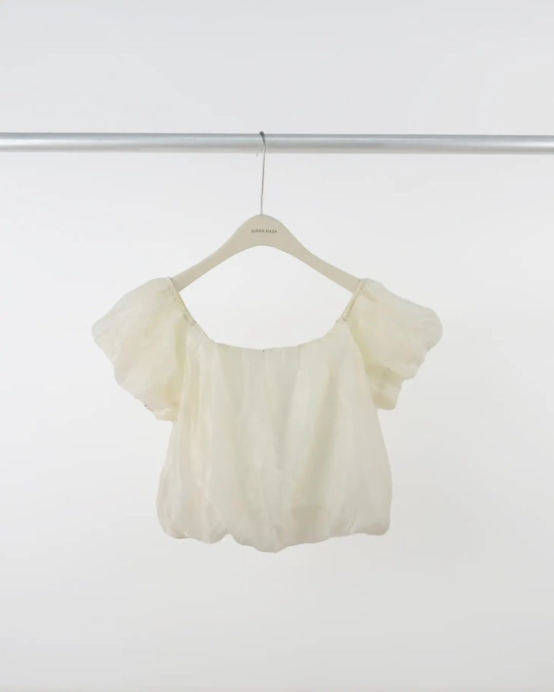 An image of a  Almond-One-Size 8306 Top by  Mirra Masa