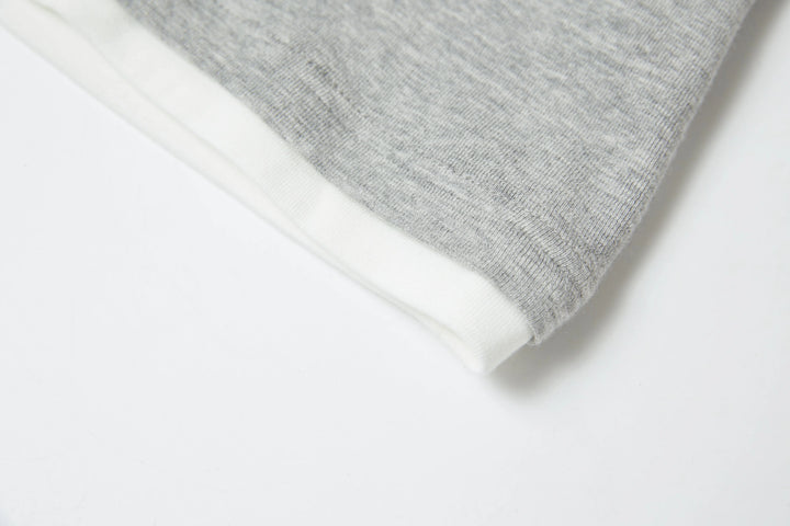 An image of a   8384Q Layered Roundneck Top by  Mirra Masa