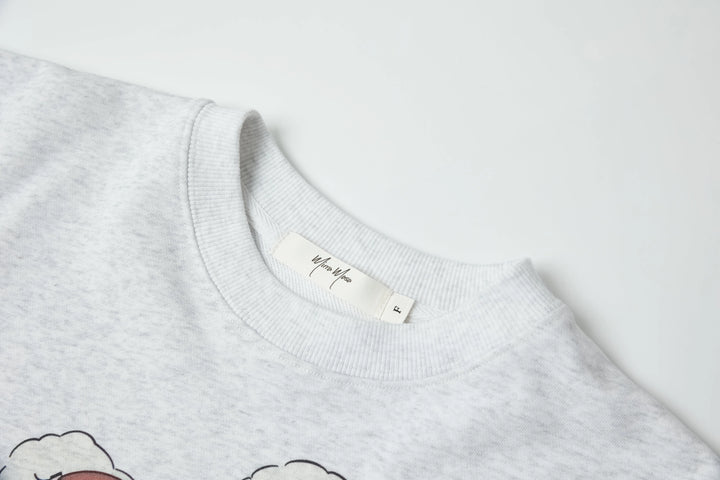 An image of a   8965C Graphic Crewneck Top by  Mirra Masa