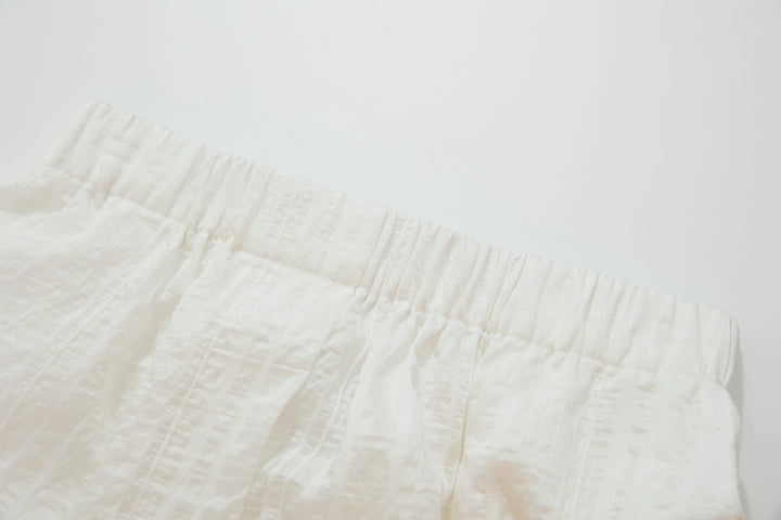An image of a   91421K Textured Shorts by  Mirra Masa