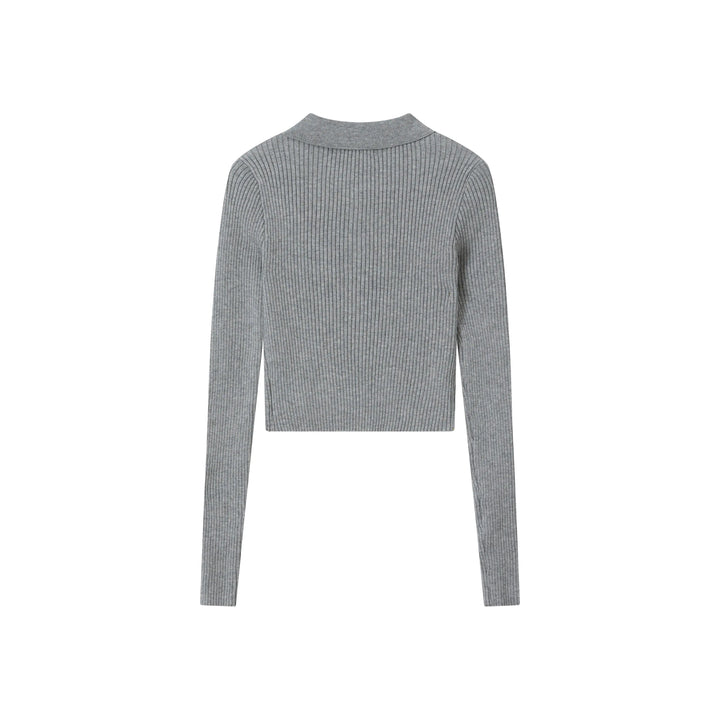 An image of a   9976 Zip-Up Knit Top by  Mirra Masa