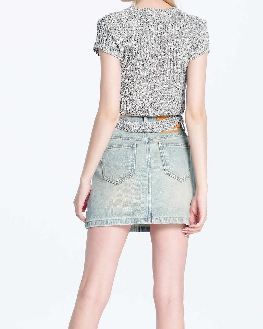 An image of a   C2000H Knit Top With Cut-Out Back by  Mirra Masa