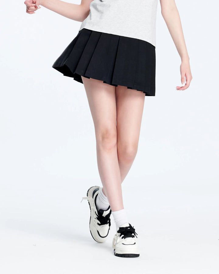 An image of a  Black-28 C7021 Pleated Mini Skirt by  Mirra Masa