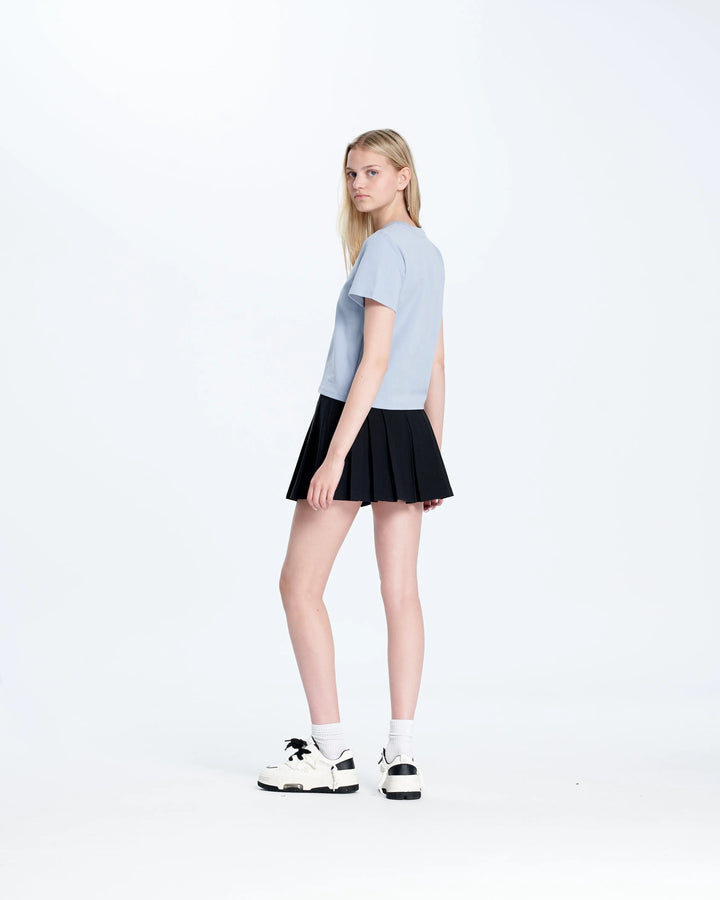 An image of a   C7021 Pleated Mini Skirt by  Mirra Masa