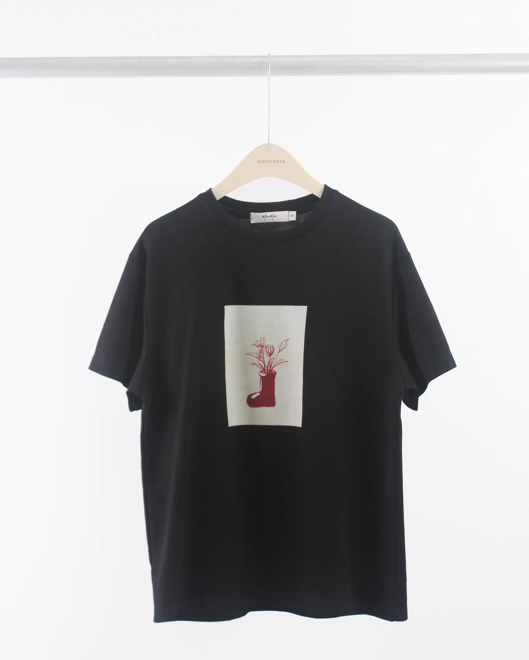 An image of a  Black-Medium D6615 Graphic T-Shirt by  Mirra Masa