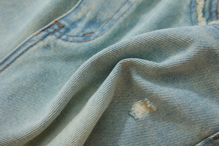 An image of a   HZ8863 Distressed Denim Shorts by  Mirra Masa