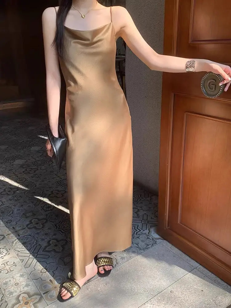 An image of a  Brown-Small M16679 Silky Slip Dress by  Mirra Masa