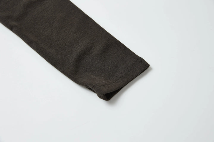 An image of a   M'Essentials True Form Layering V-Neck by  Mirra Masa