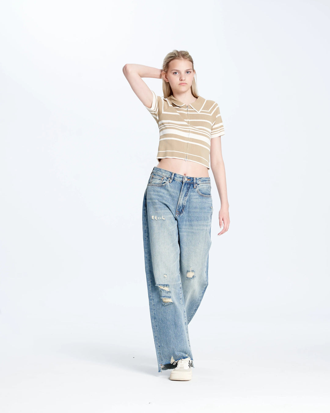 An image of a   N2C20 Cropped Polo Top by  Mirra Masa